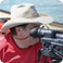 Earl Rouse filming with a camera
